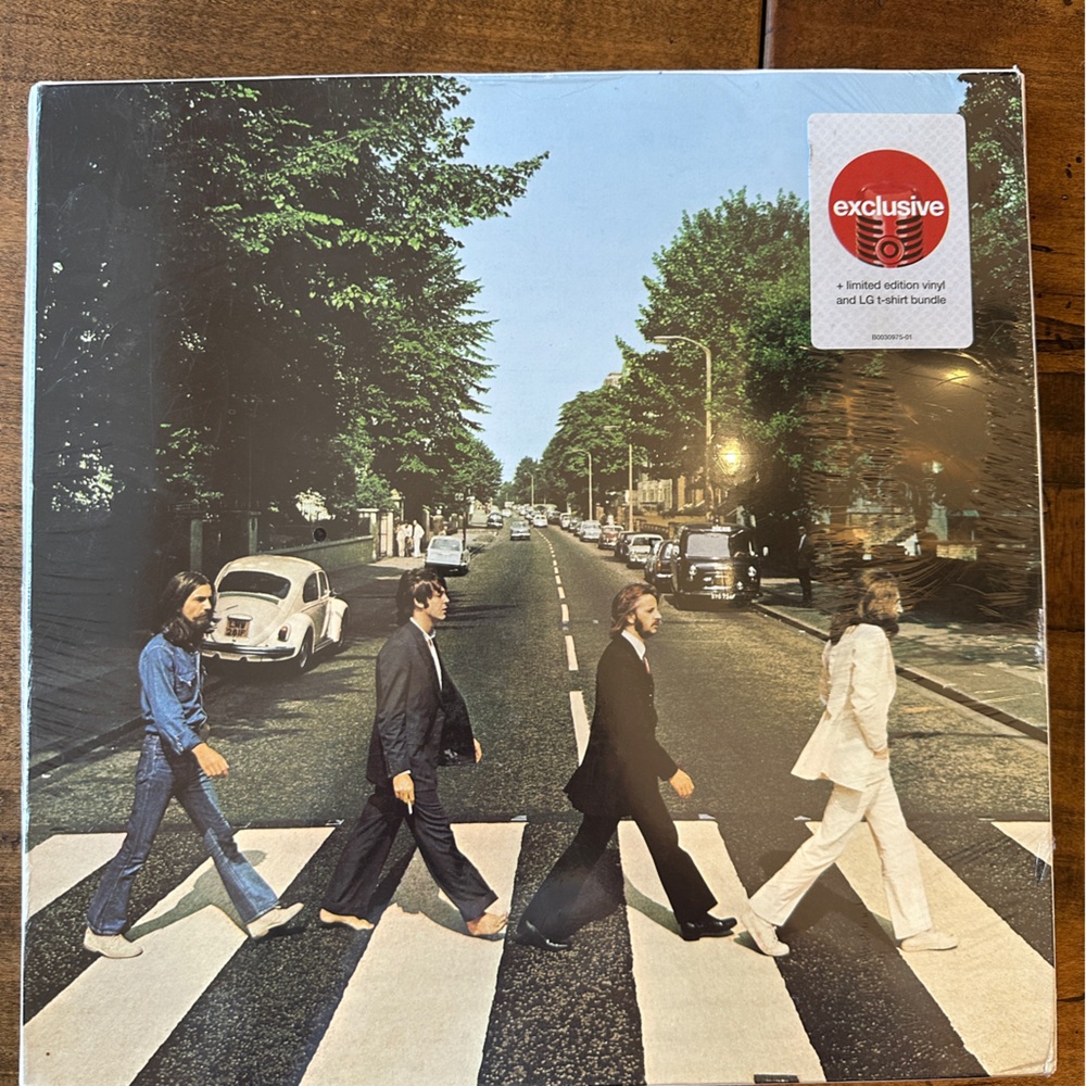 The Beatles Abbey Road Anniversary Edition vinyl and tshirt